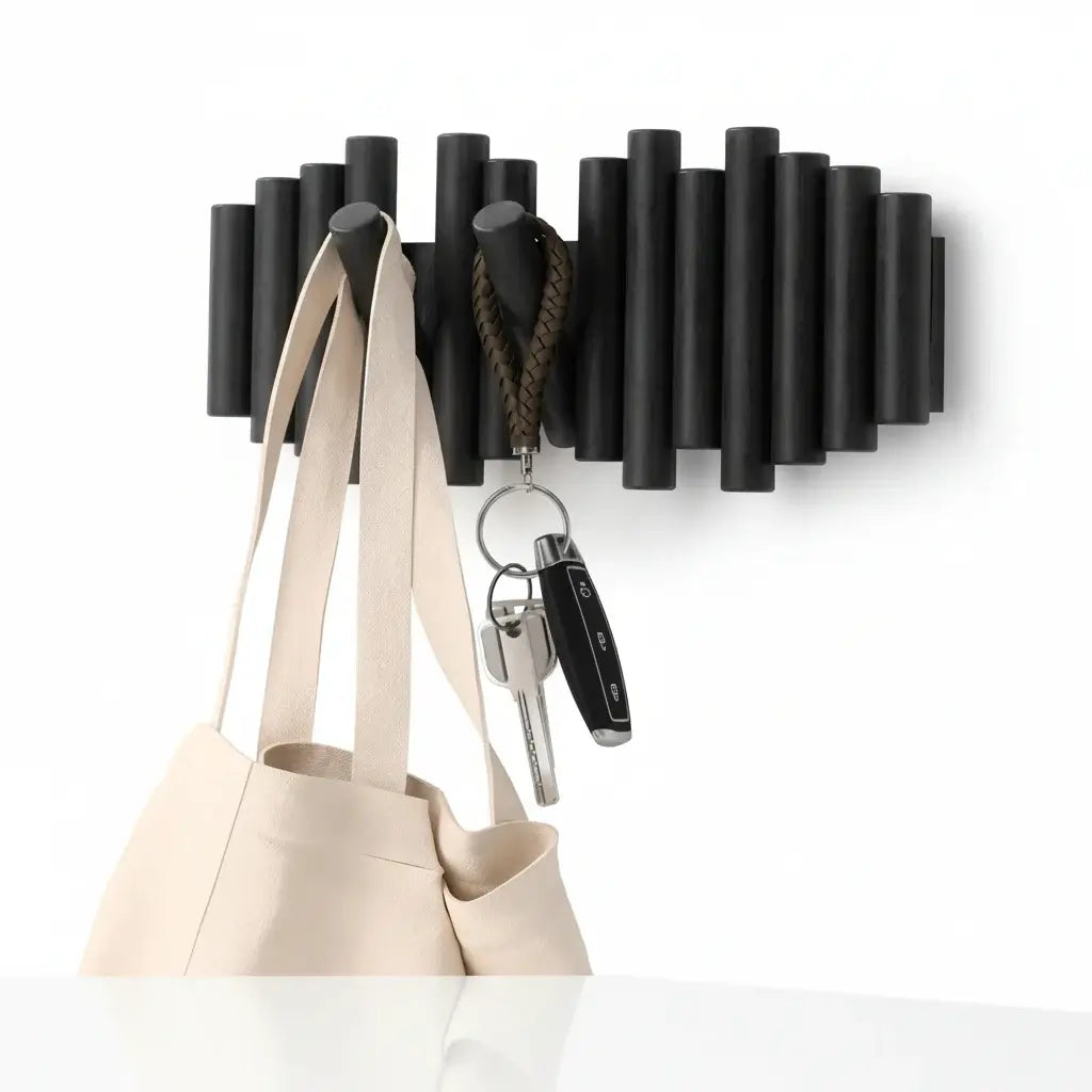 Wall-Mounted Rack with Retractable Pegs